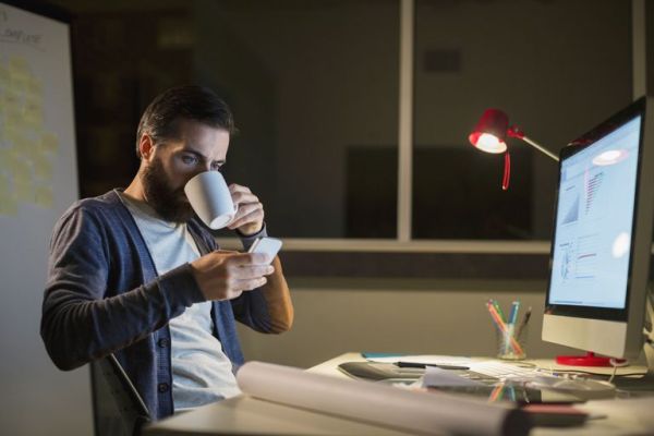 Guy drinking and communicating