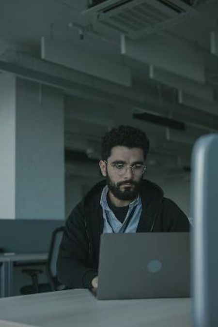 man using laptop